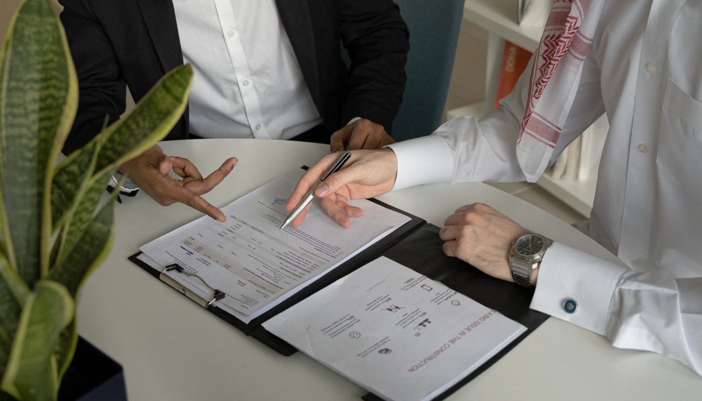 Policies Header Image - Documents being signed